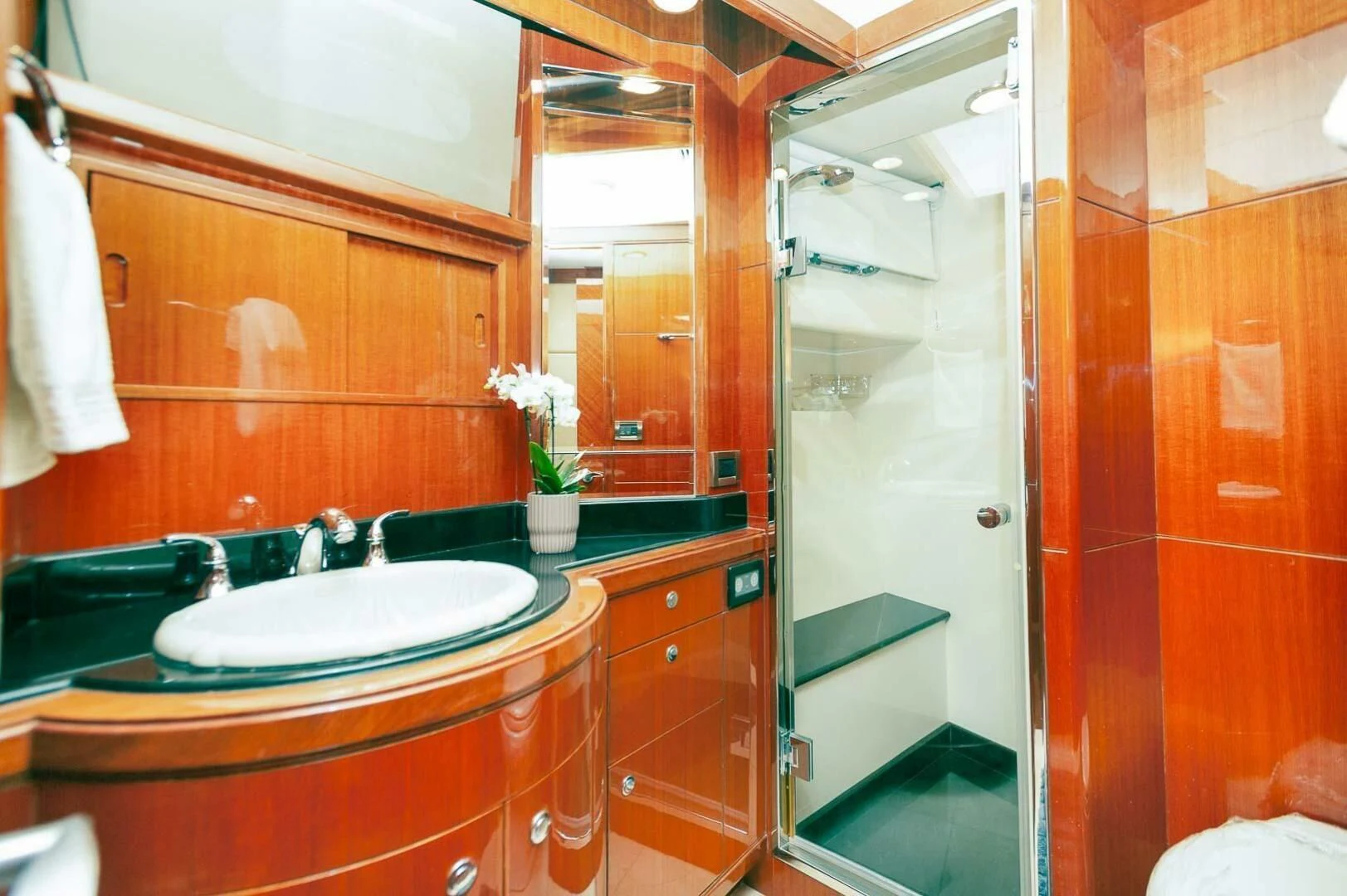 a bathroom with a sink and a shower aboard COCONUT Yacht for Sale