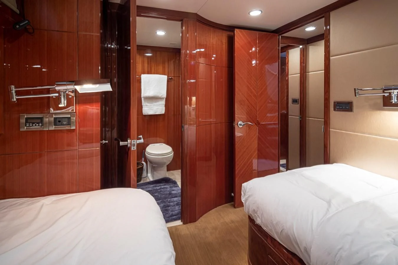 a bathroom with a tub and toilet aboard COCONUT Yacht for Sale