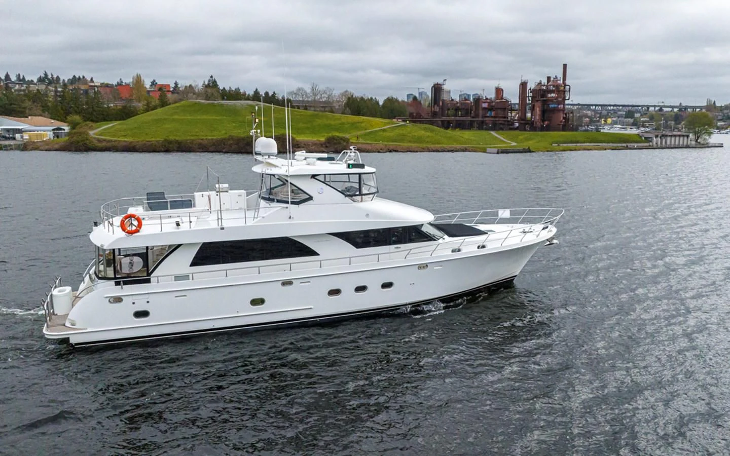 a white yacht on the water aboard COCONUT Yacht for Sale