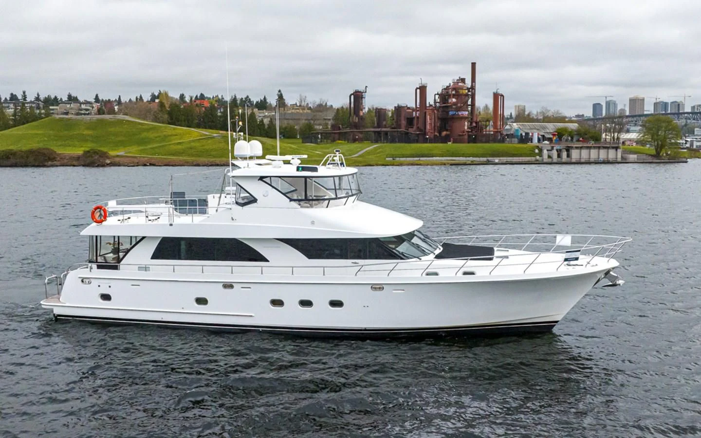 a white yacht on the water aboard COCONUT Yacht for Sale