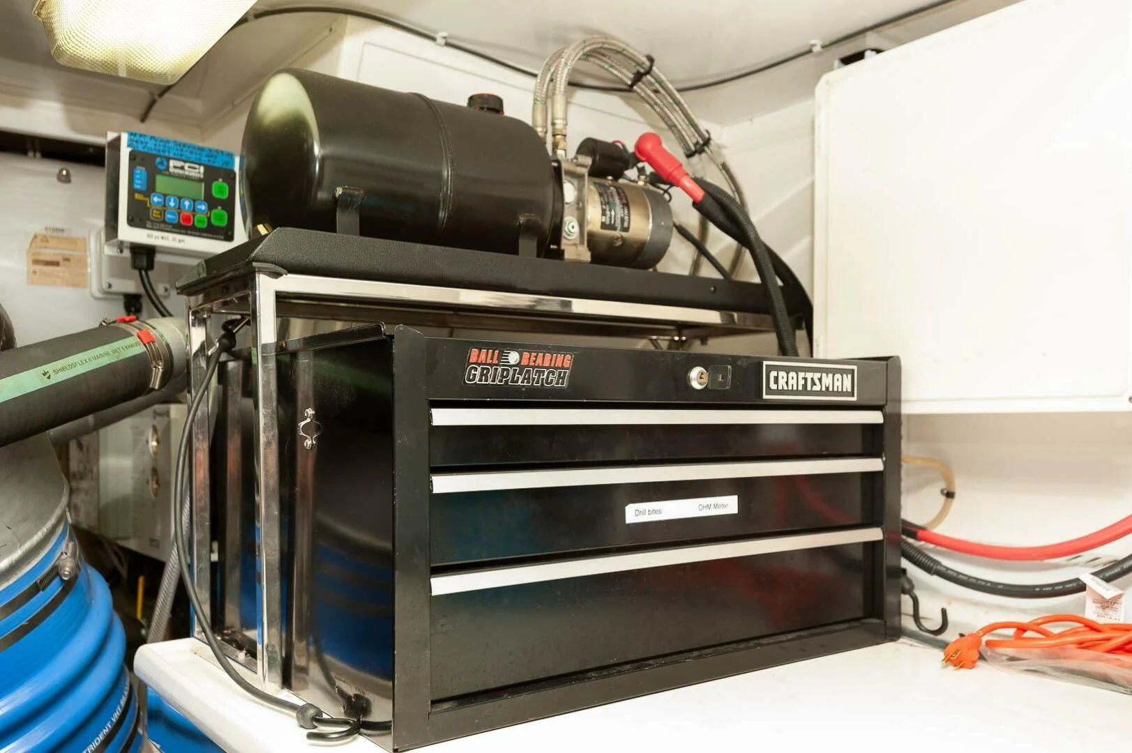 a machine with a black case aboard COCONUT Yacht for Sale