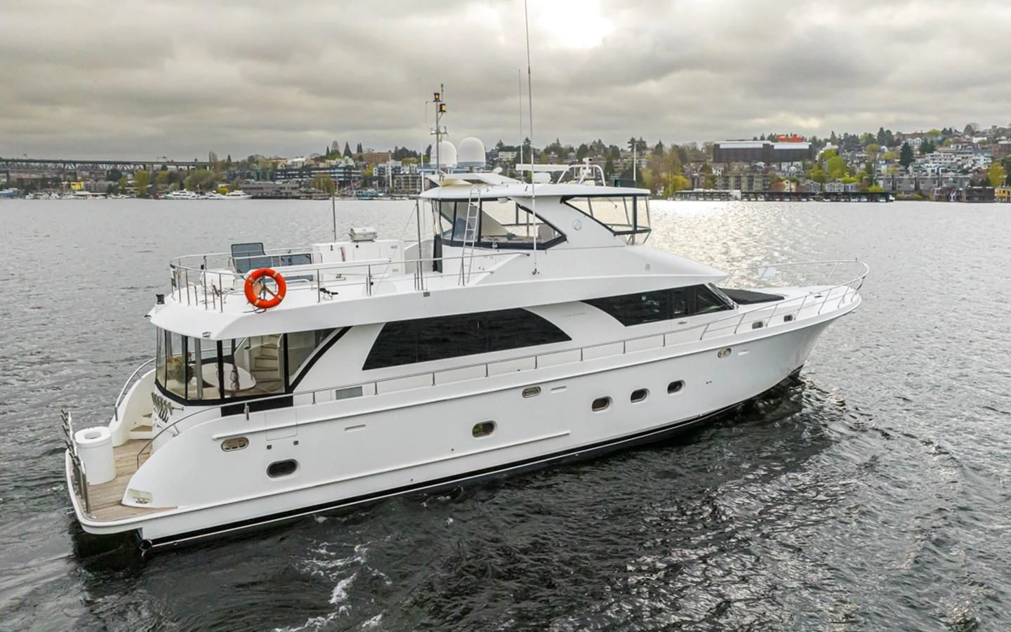 a white yacht on the water aboard COCONUT Yacht for Sale