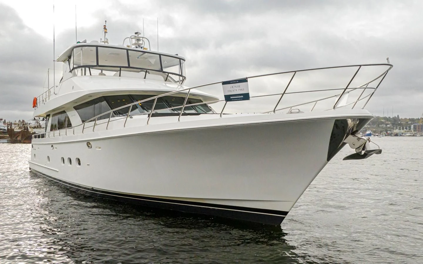a white boat on the water aboard COCONUT Yacht for Sale