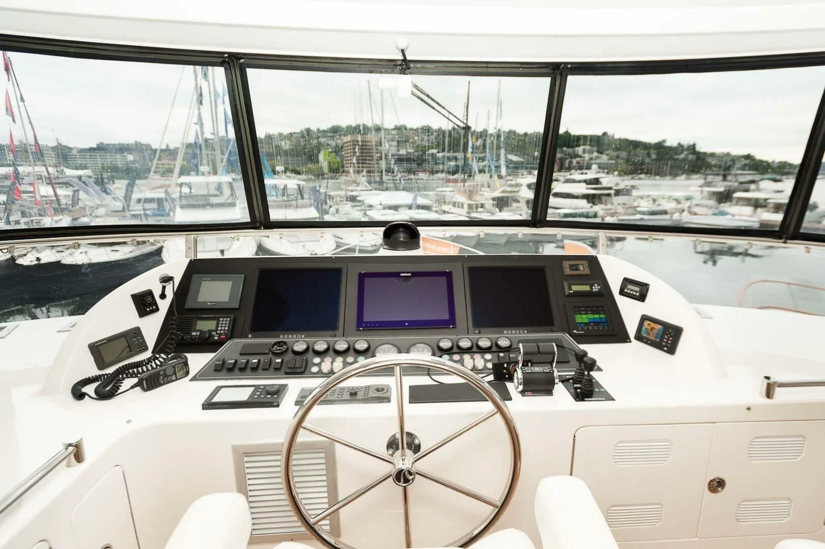inside of a white car aboard COCONUT Yacht for Sale