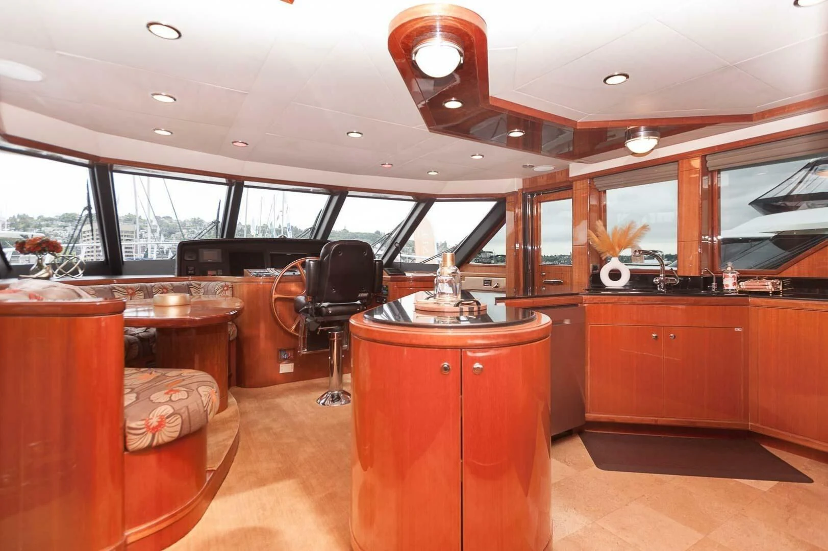 a large room with a table and chairs aboard COCONUT Yacht for Sale
