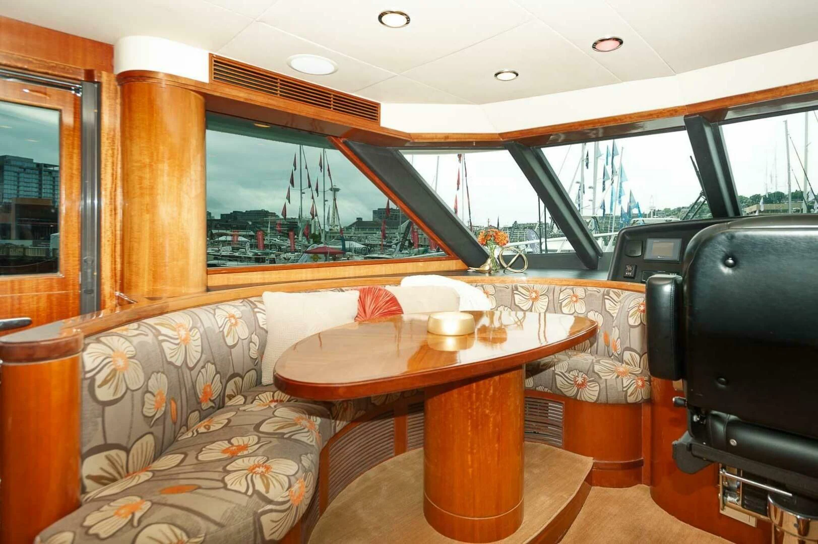 a table and chairs in a room aboard COCONUT Yacht for Sale