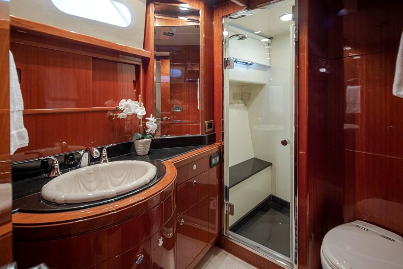 a bathroom with a sink and a toilet aboard COCONUT Yacht for Sale