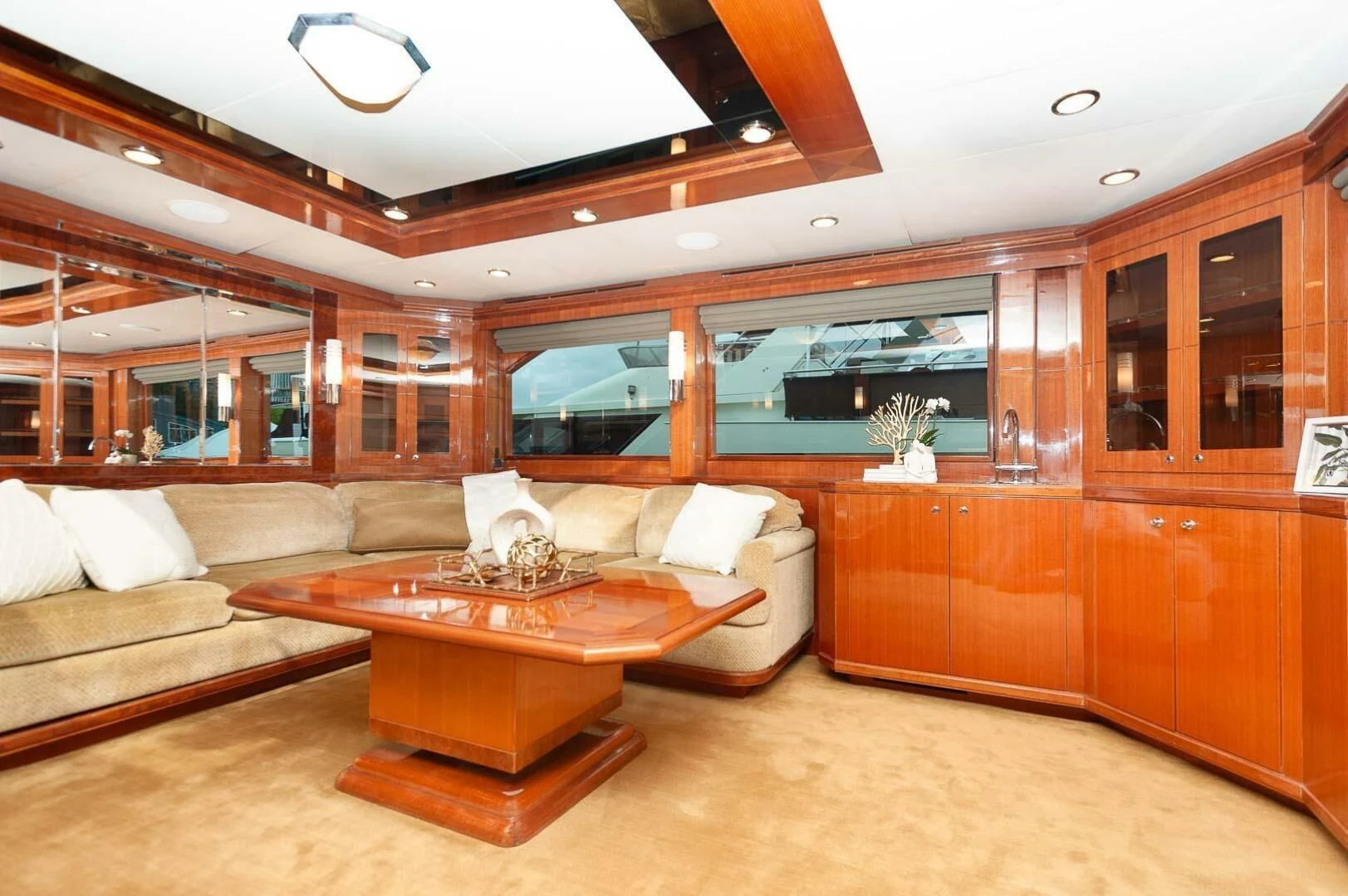 a living room with a couch and a coffee table aboard COCONUT Yacht for Sale