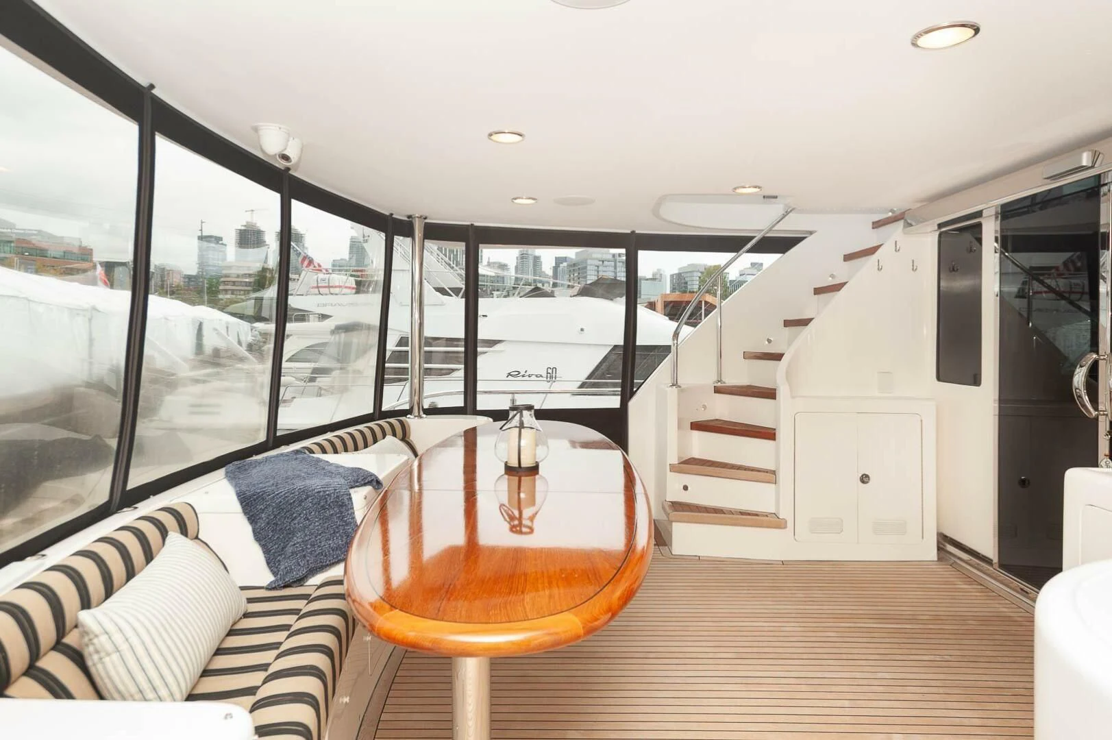a room with a table and chairs aboard COCONUT Yacht for Sale