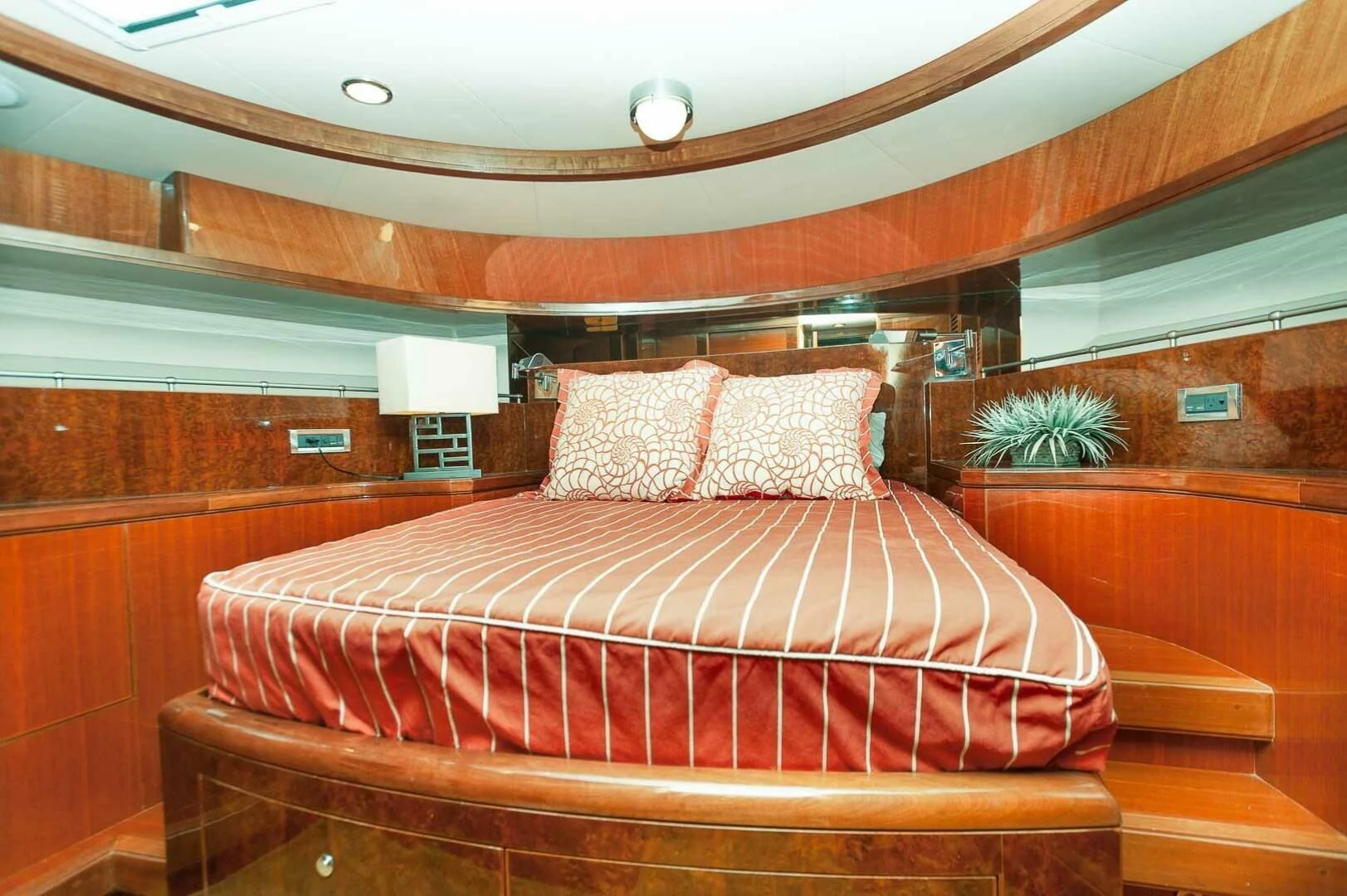 a bed in a room aboard COCONUT Yacht for Sale
