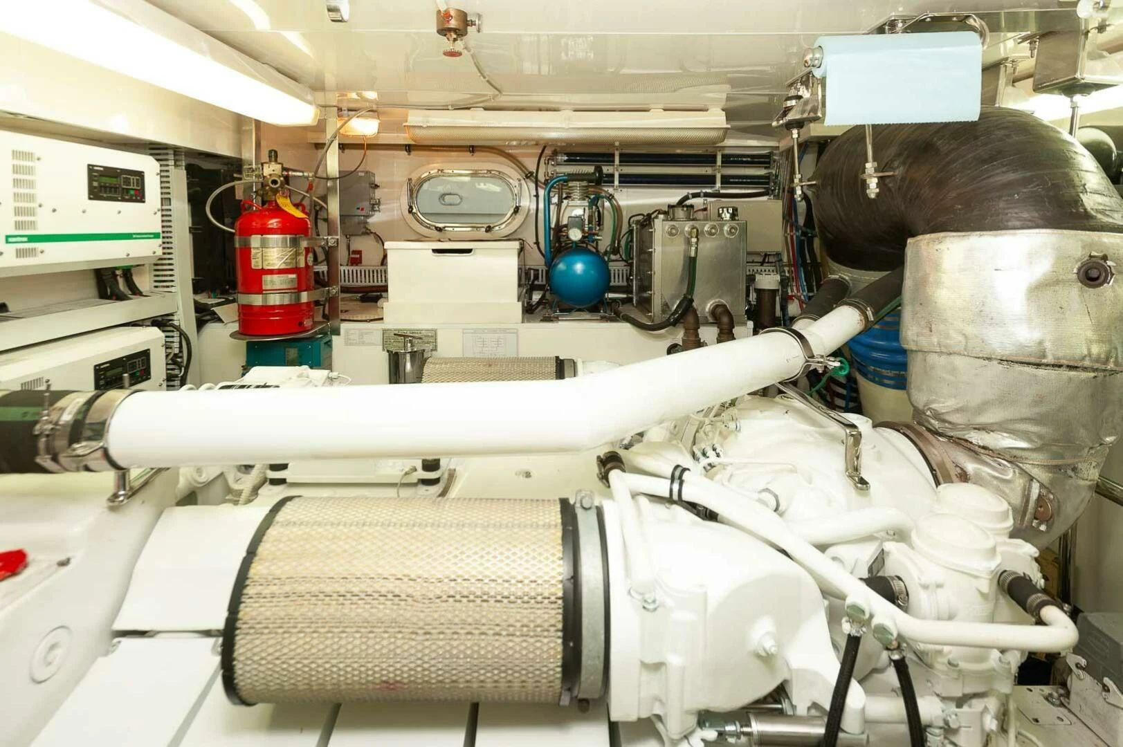 a person in a mask in a room with a machine aboard COCONUT Yacht for Sale