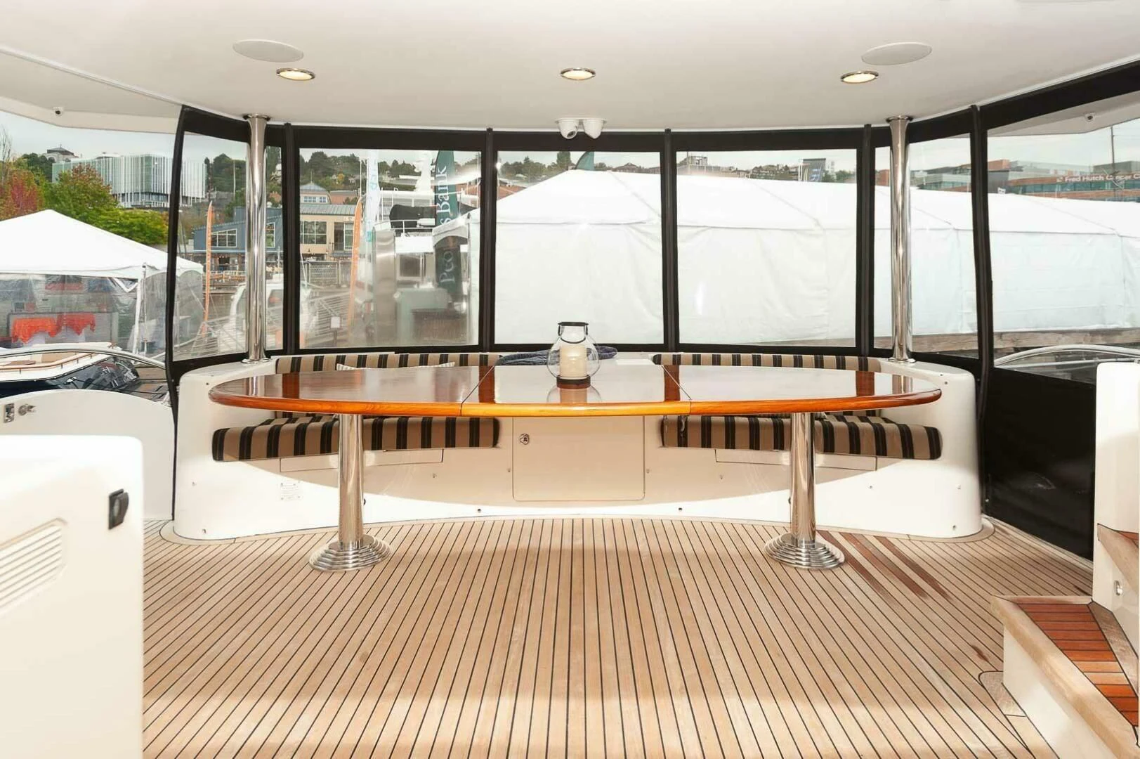 a room with a table and chairs aboard COCONUT Yacht for Sale