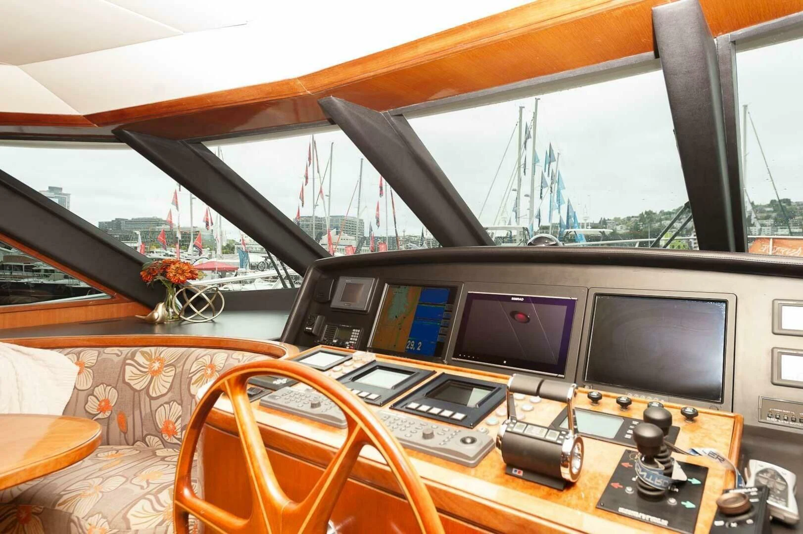 a group of monitors on a table aboard COCONUT Yacht for Sale