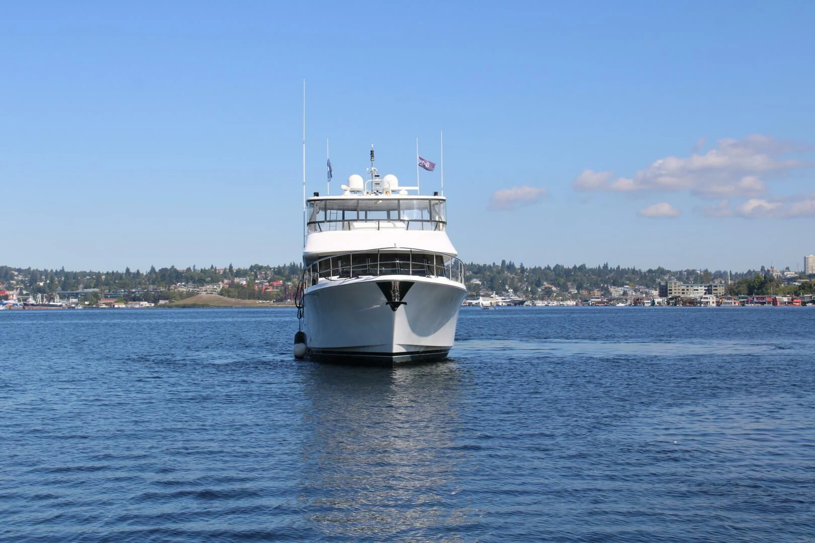 a white boat in the water aboard COCONUT Yacht for Sale