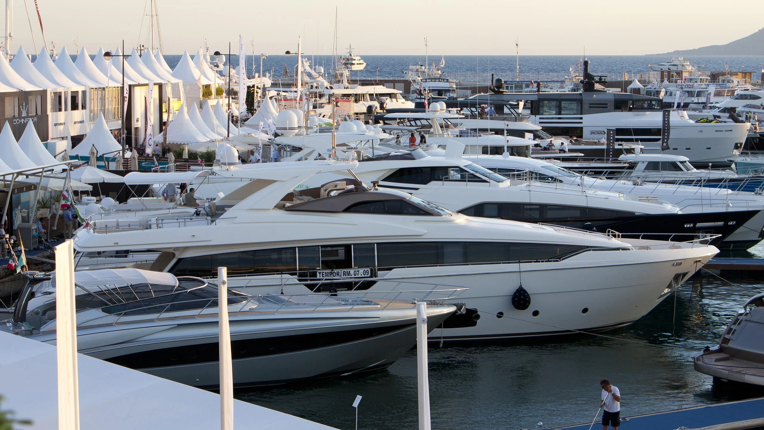 a group of yachts in a harbor aboard CLUB M Yacht for Sale