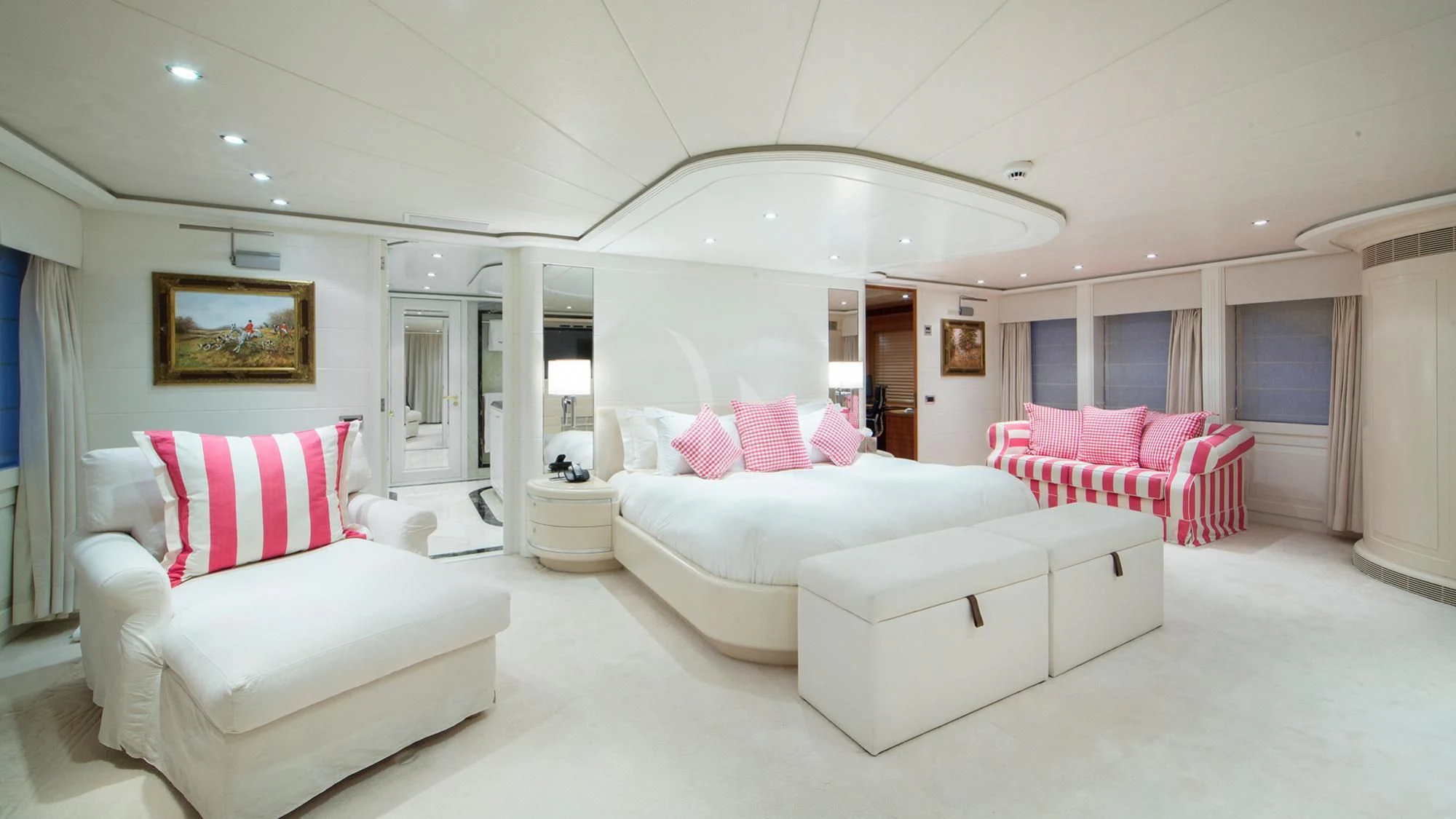 a living room with white couches aboard BENIK Yacht for Charter