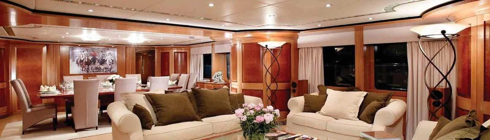 a room with couches and chairs aboard BENIK Yacht for Charter