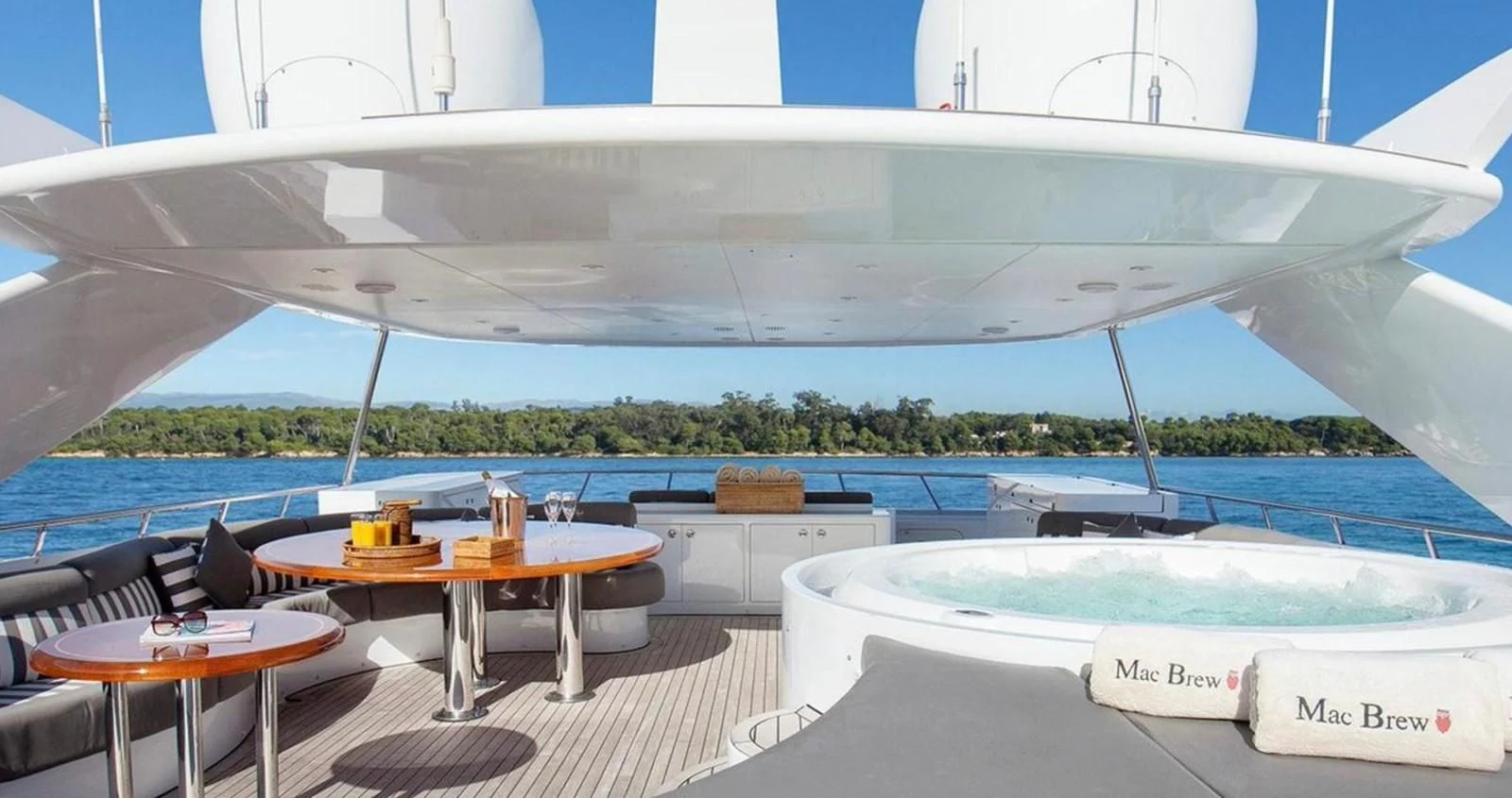 a room with a table and chairs aboard BENIK Yacht for Charter