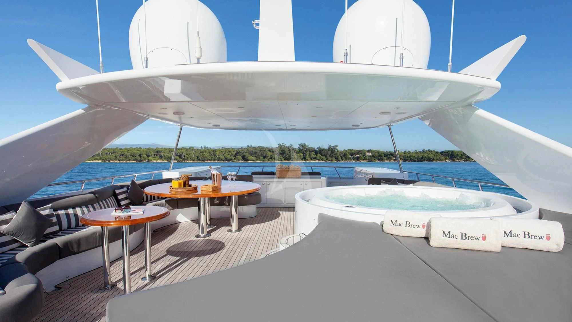 a plane wing with tables and chairs aboard BENIK Yacht for Charter