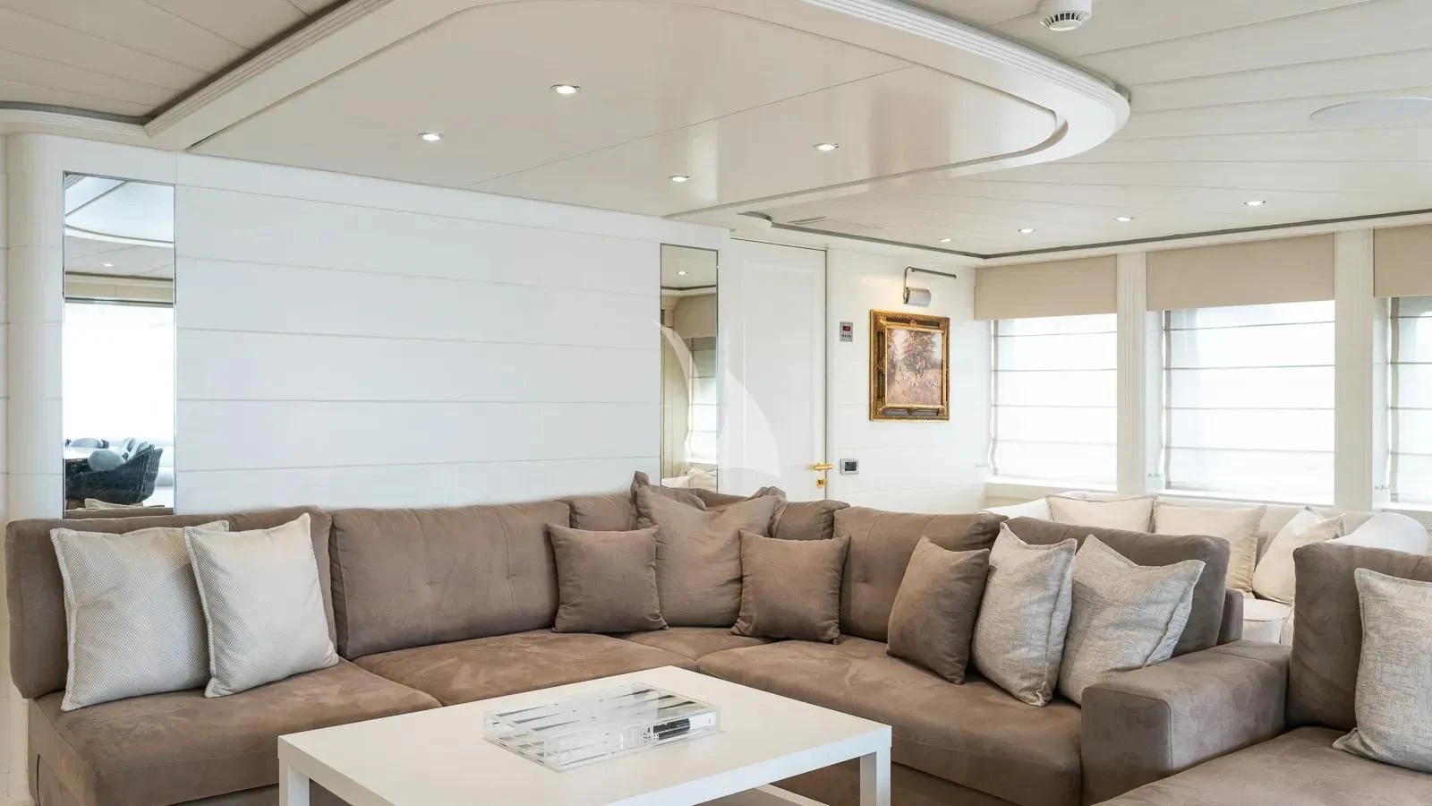 a living room with a couch and a table aboard BENIK Yacht for Charter