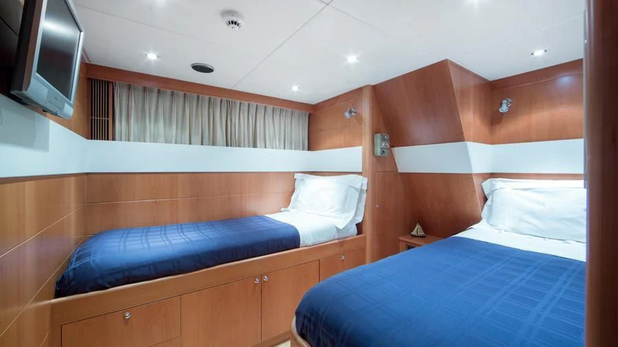 a room with bunk beds aboard BENIK Yacht for Charter