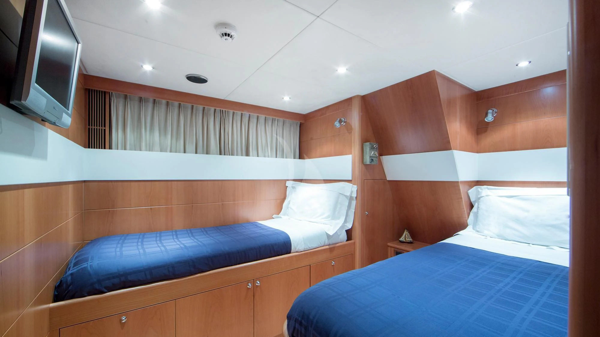 a room with bunk beds aboard BENIK Yacht for Charter