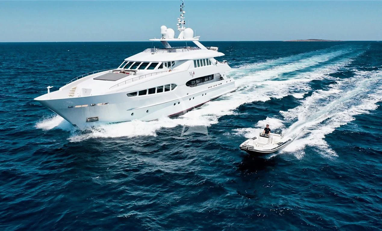 a boat with a person on it aboard BENIK Yacht for Charter
