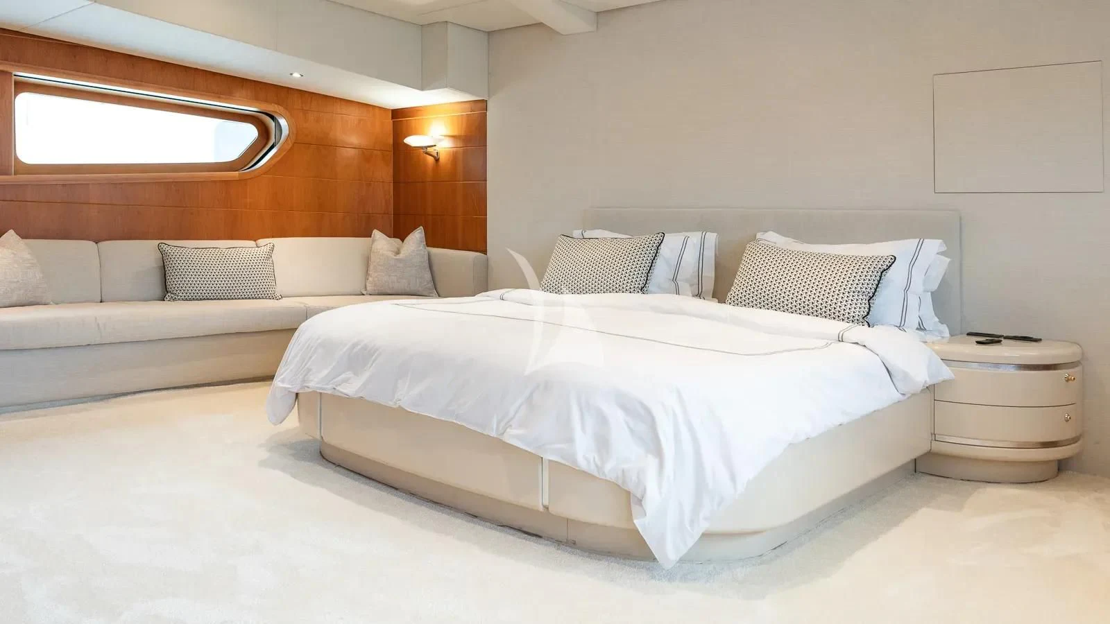 a bed with white sheets aboard BENIK Yacht for Charter