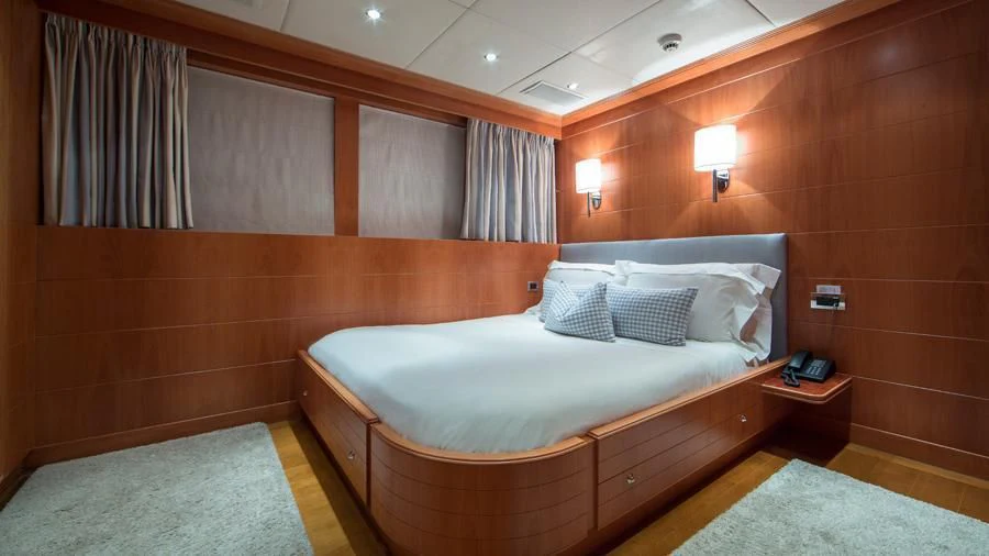 a bed in a room aboard BENIK Yacht for Charter