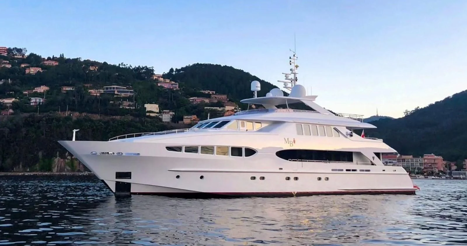 a white yacht on the water aboard BENIK Yacht for Charter