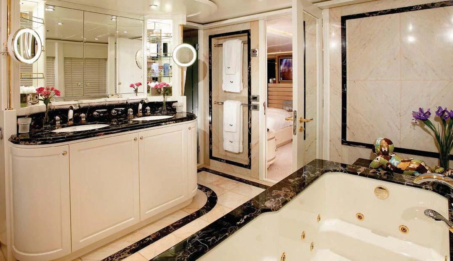 a bathroom with a large marble countertop aboard BENIK Yacht for Charter