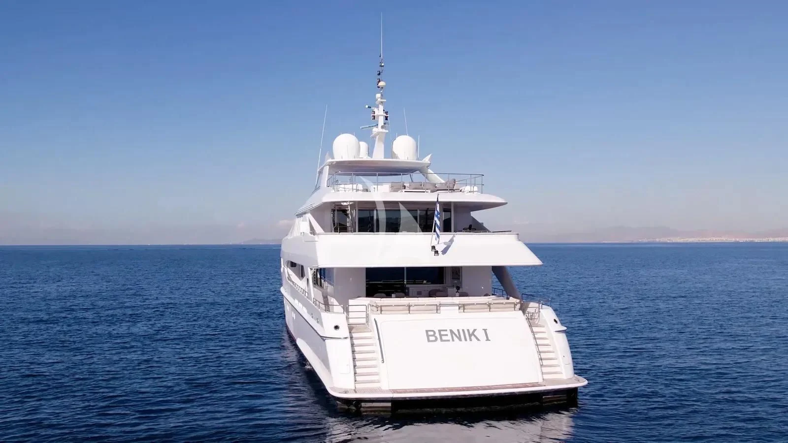 a white boat in the water aboard BENIK Yacht for Charter