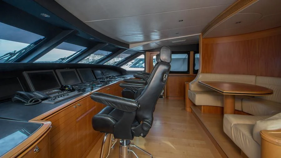 a room with a desk and a chair aboard BENIK Yacht for Charter