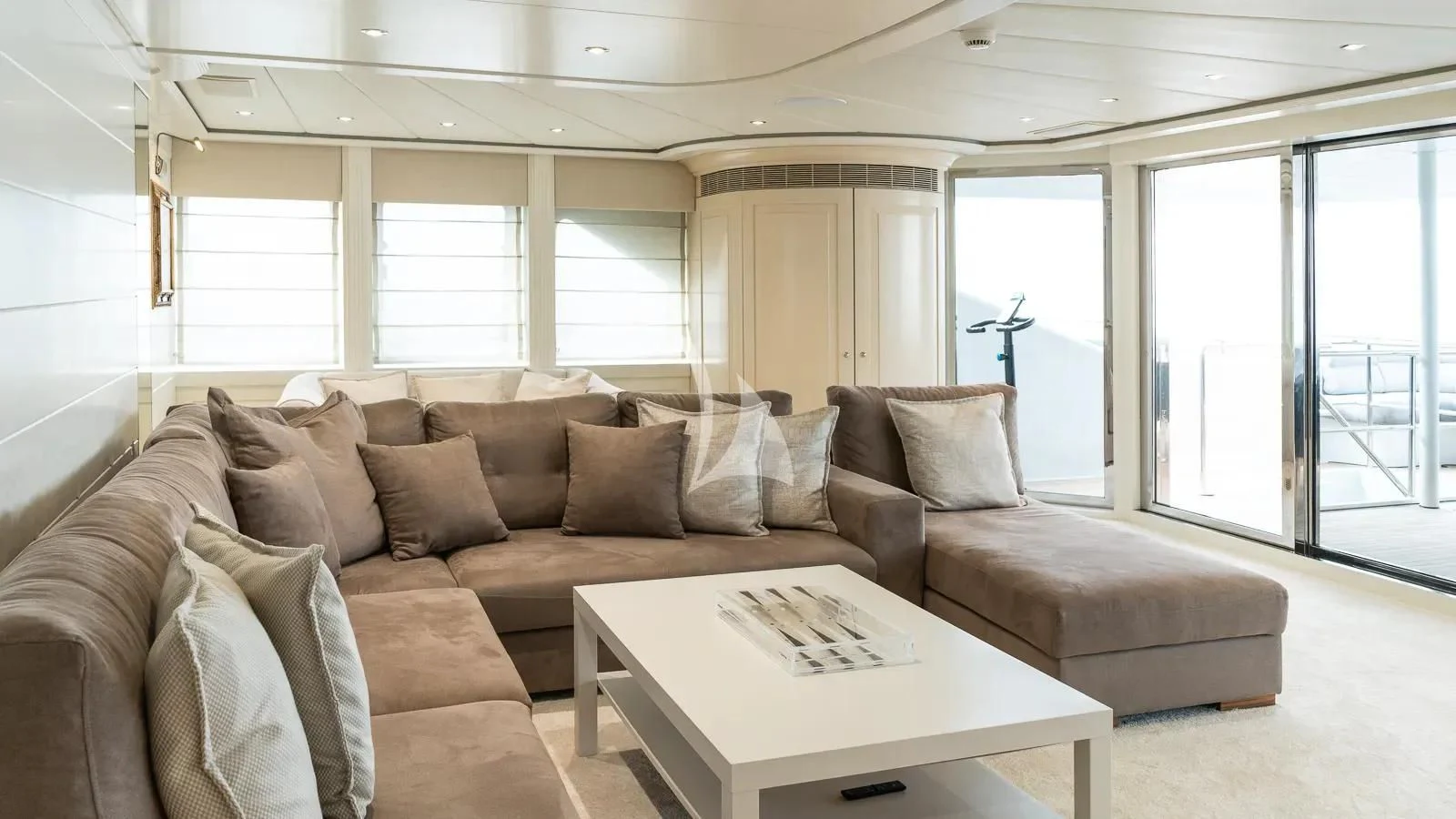 a living room with a couch and a coffee table aboard BENIK Yacht for Charter