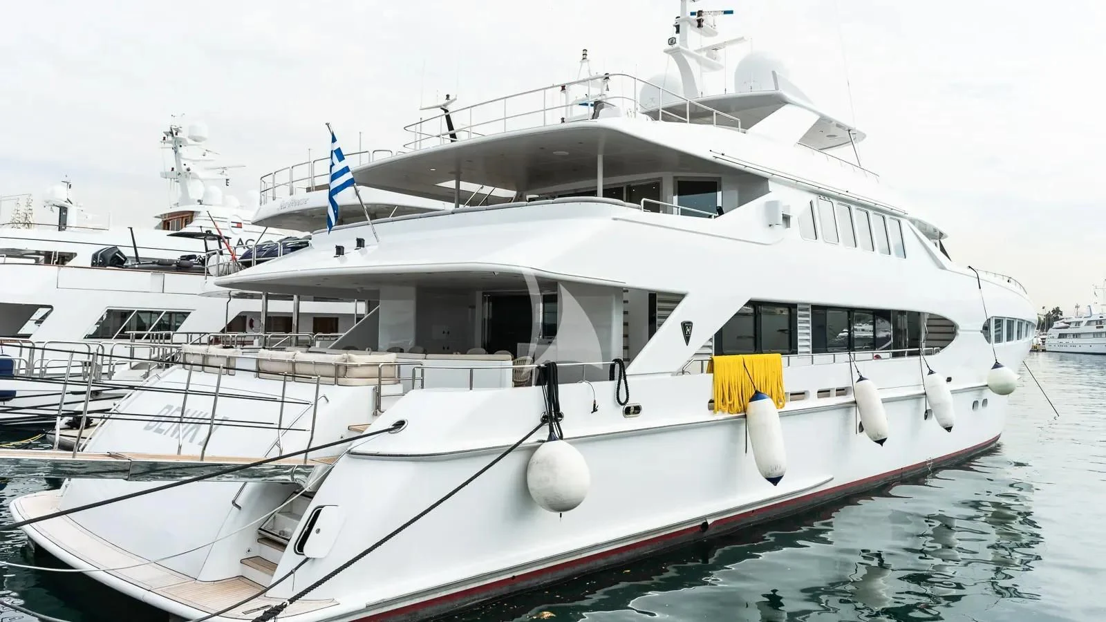 a boat docked at a pier aboard BENIK Yacht for Charter