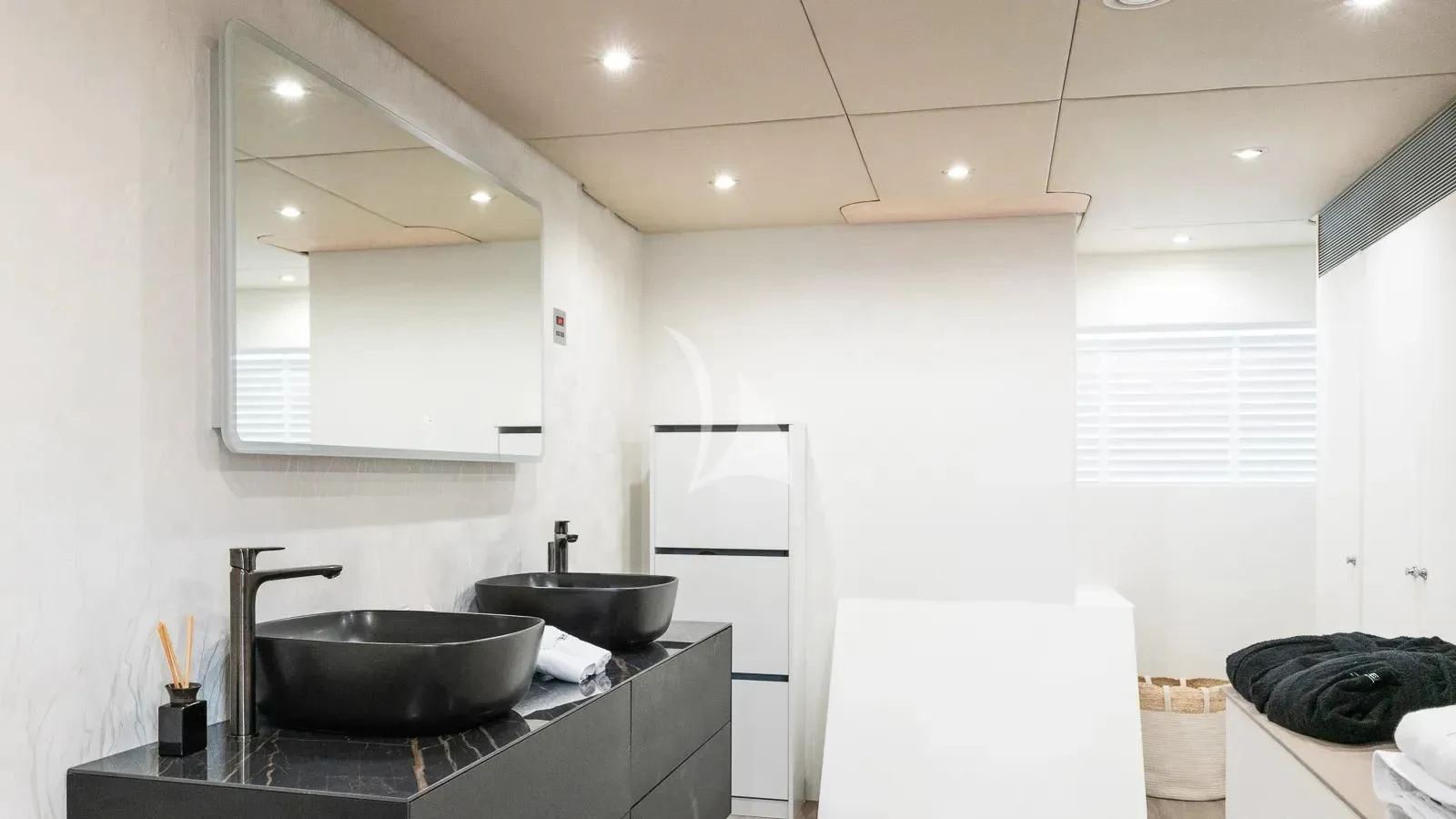 a kitchen with a sink and a stove aboard BENIK Yacht for Charter