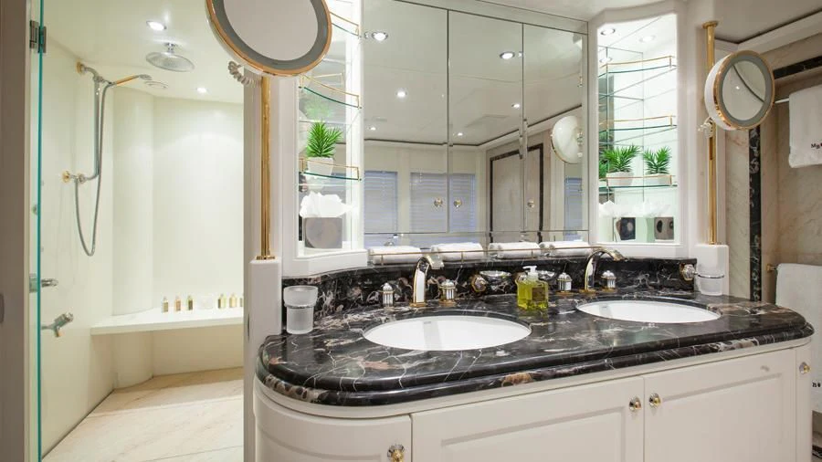 a bathroom with sinks and mirrors aboard BENIK Yacht for Charter