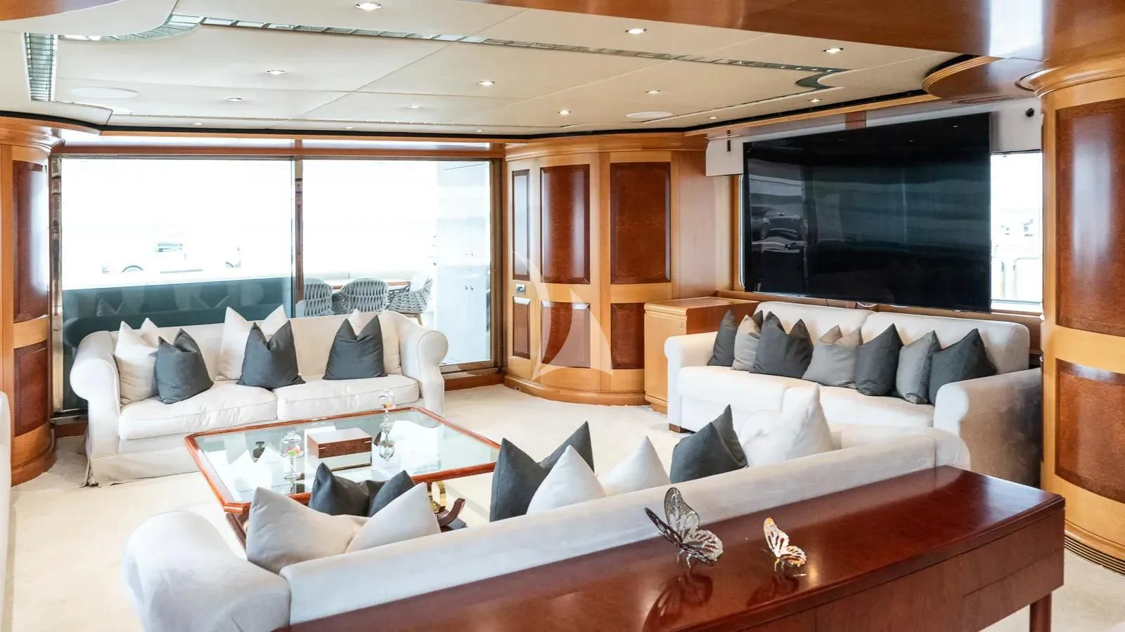 a living room with a large window aboard BENIK Yacht for Charter