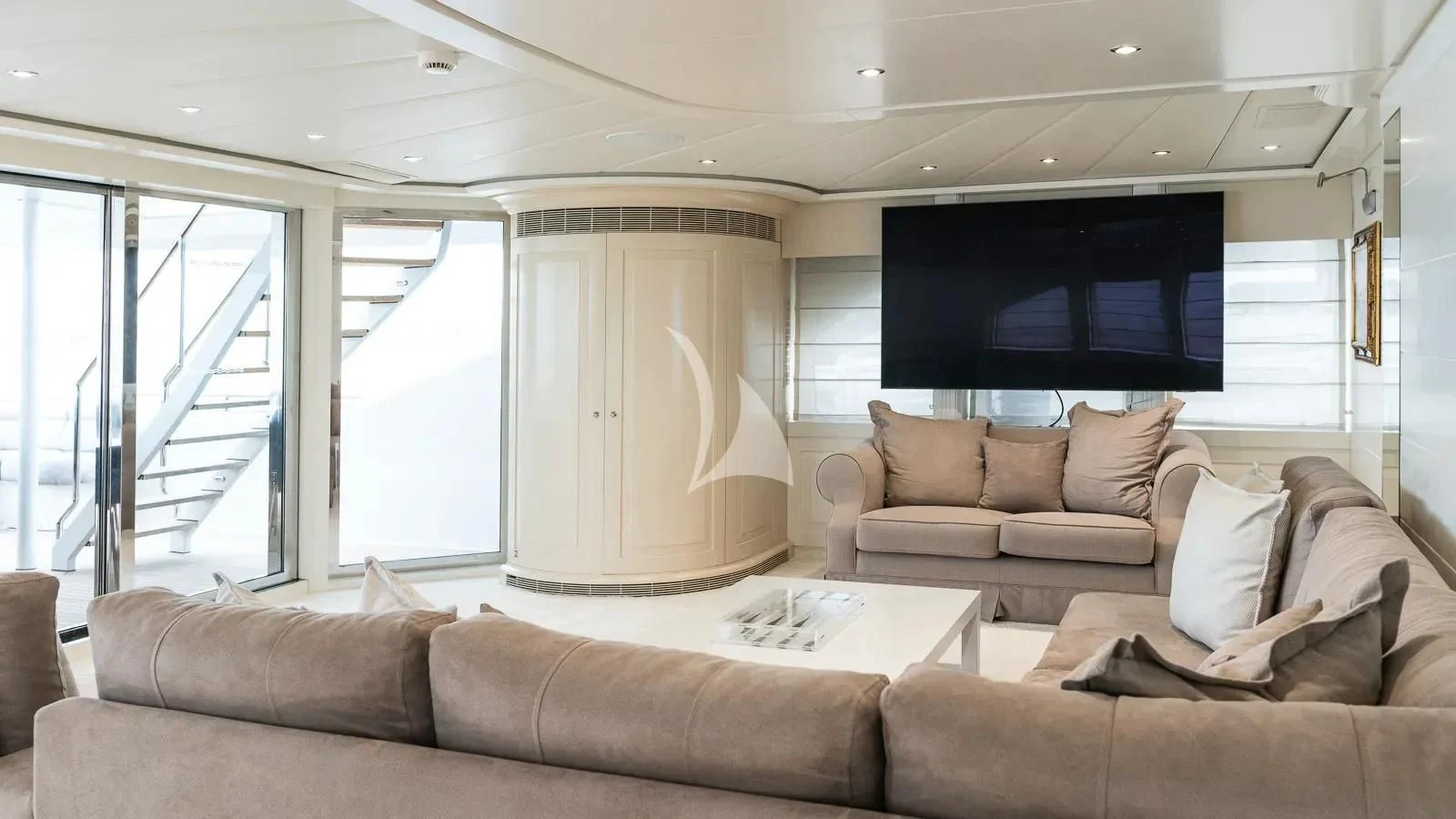 a living room with a large window aboard BENIK Yacht for Charter