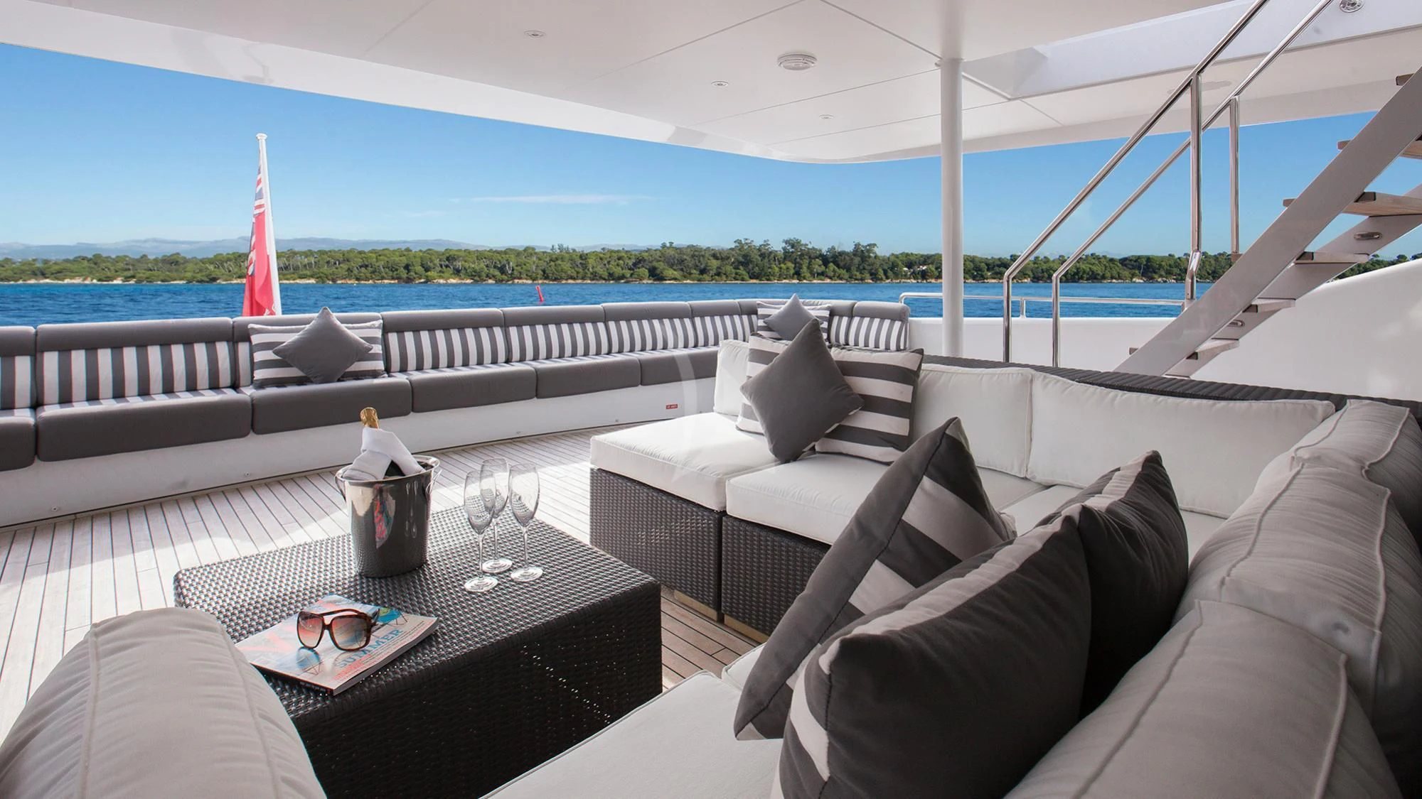 a large white sofa and a coffee table on a boat aboard BENIK Yacht for Charter