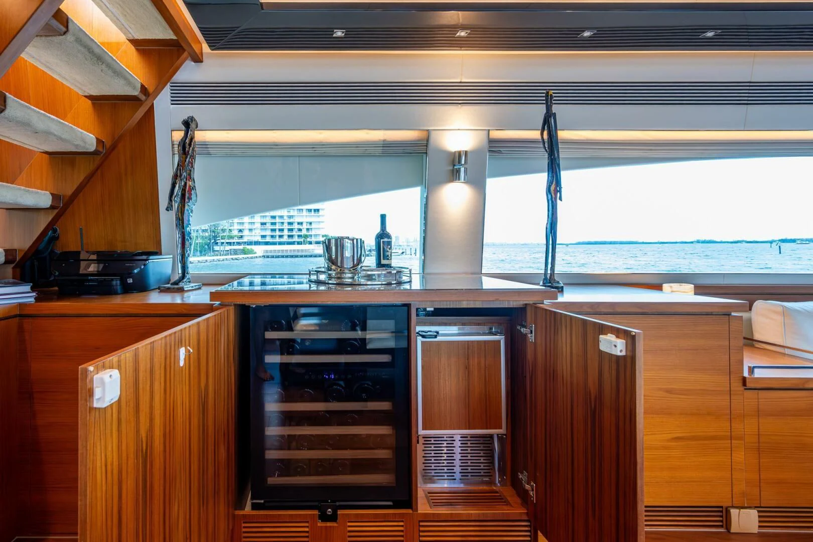 a kitchen with wooden cabinets aboard MOIRA CINCO Yacht for Sale