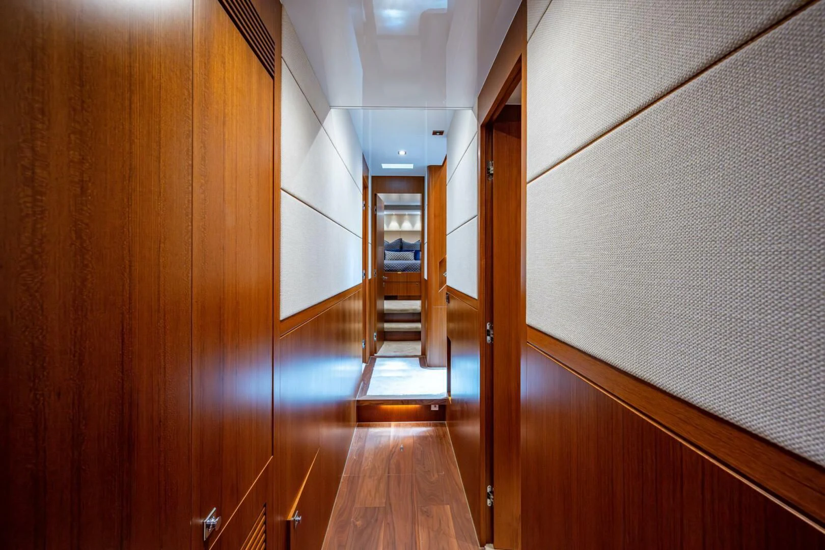a hallway with wooden floors aboard MOIRA CINCO Yacht for Sale