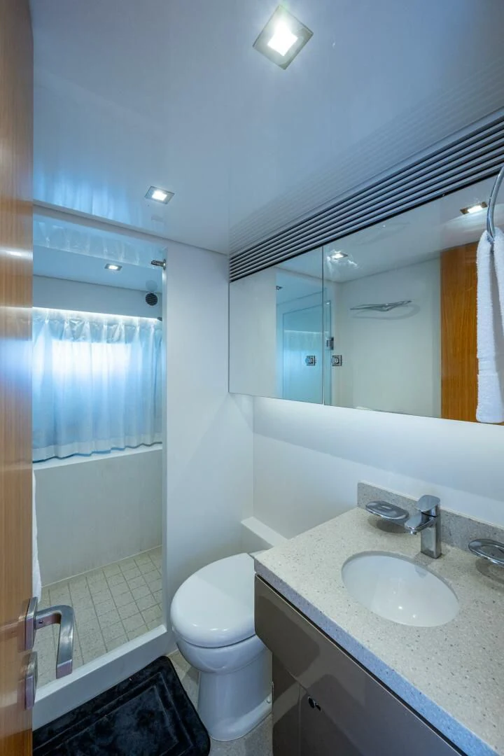 a bathroom with a sink and a toilet aboard MOIRA CINCO Yacht for Sale