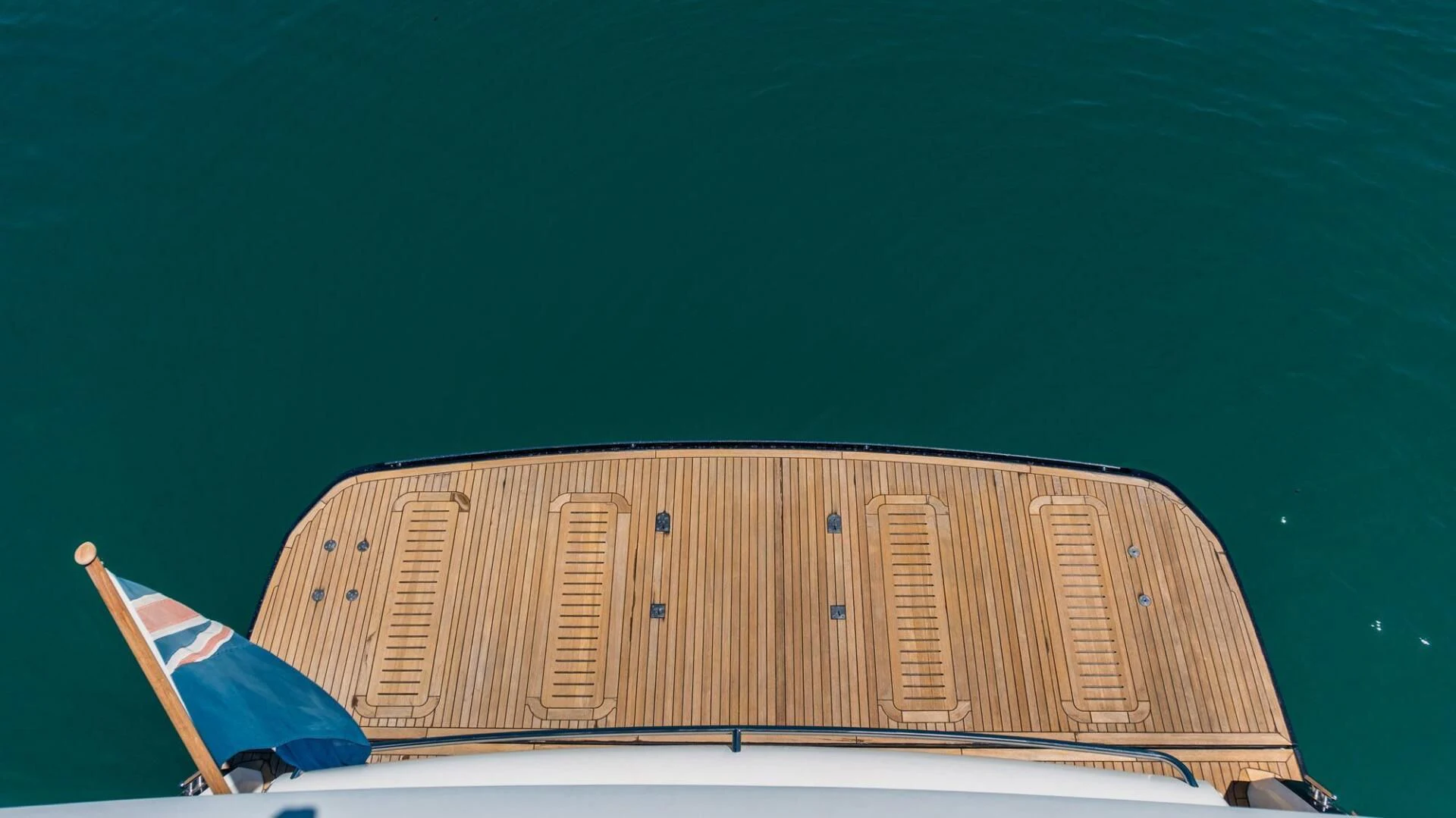 a person sitting in front of a large wooden structure aboard MOIRA CINCO Yacht for Sale