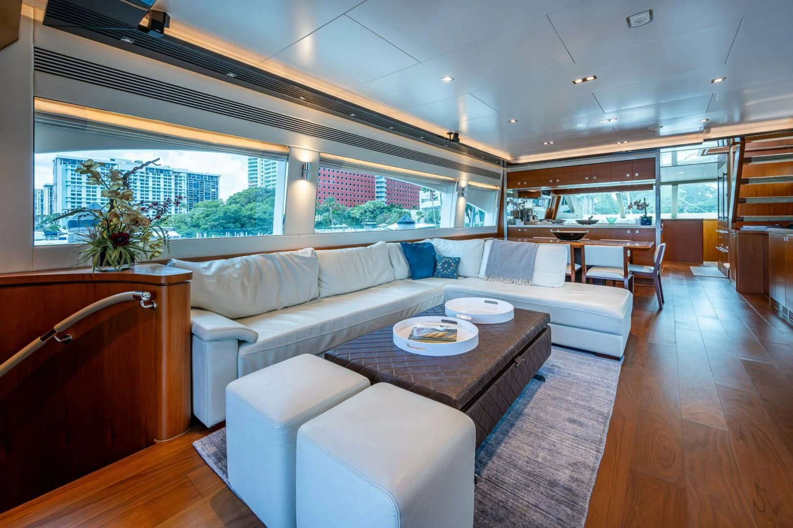 a living room with a large window aboard MOIRA CINCO Yacht for Sale