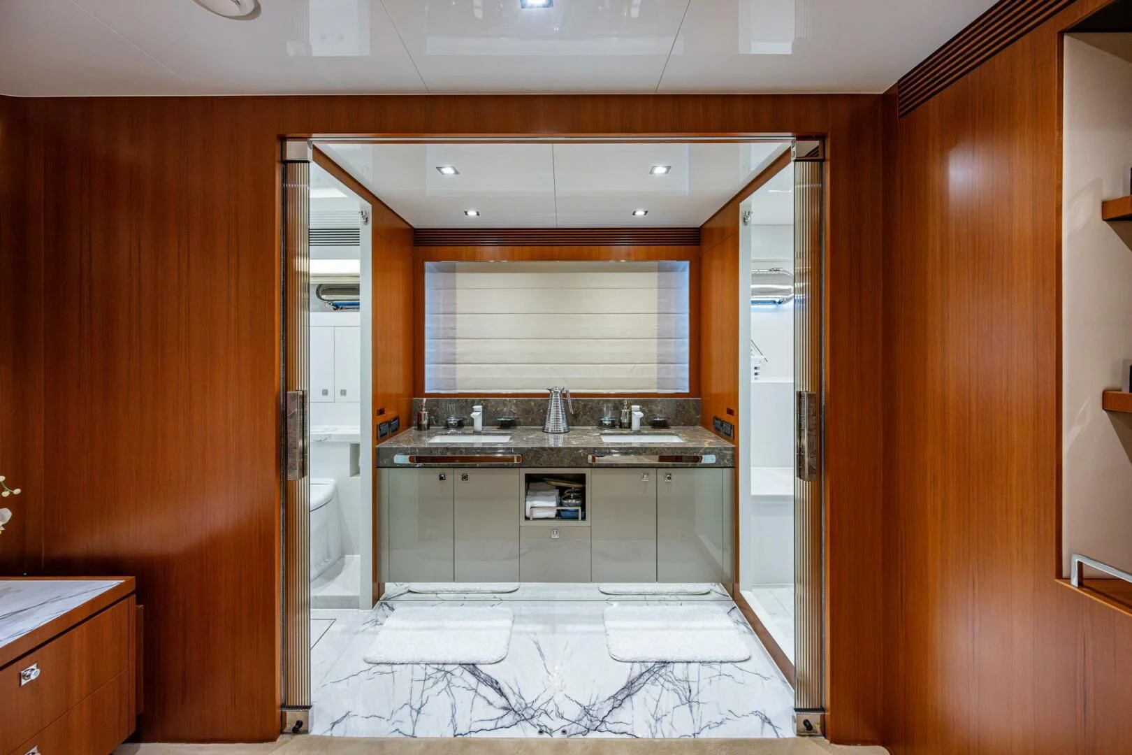 a kitchen with a large glass door aboard MOIRA CINCO Yacht for Sale