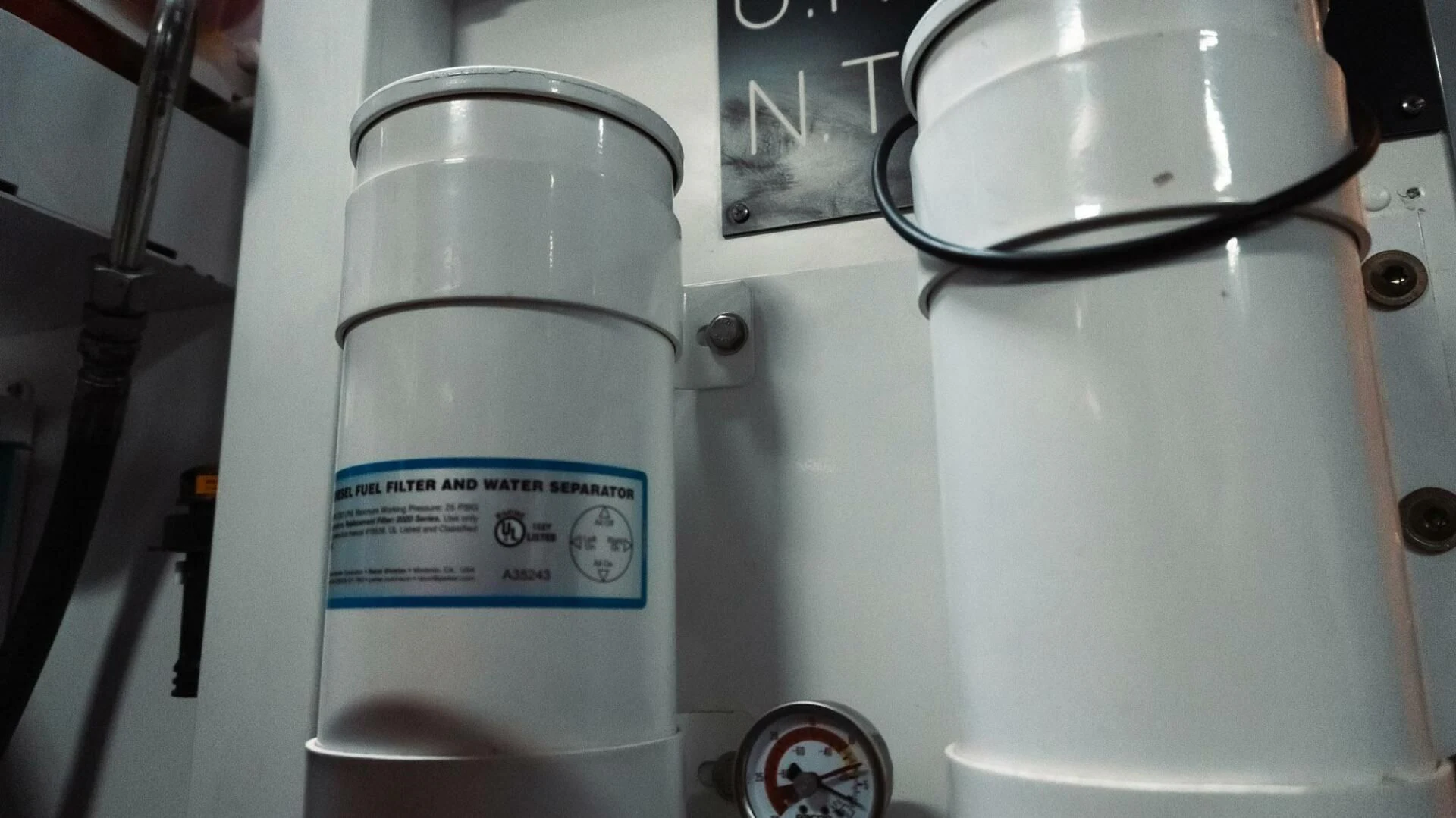 a white machine with a label aboard MOIRA CINCO Yacht for Sale