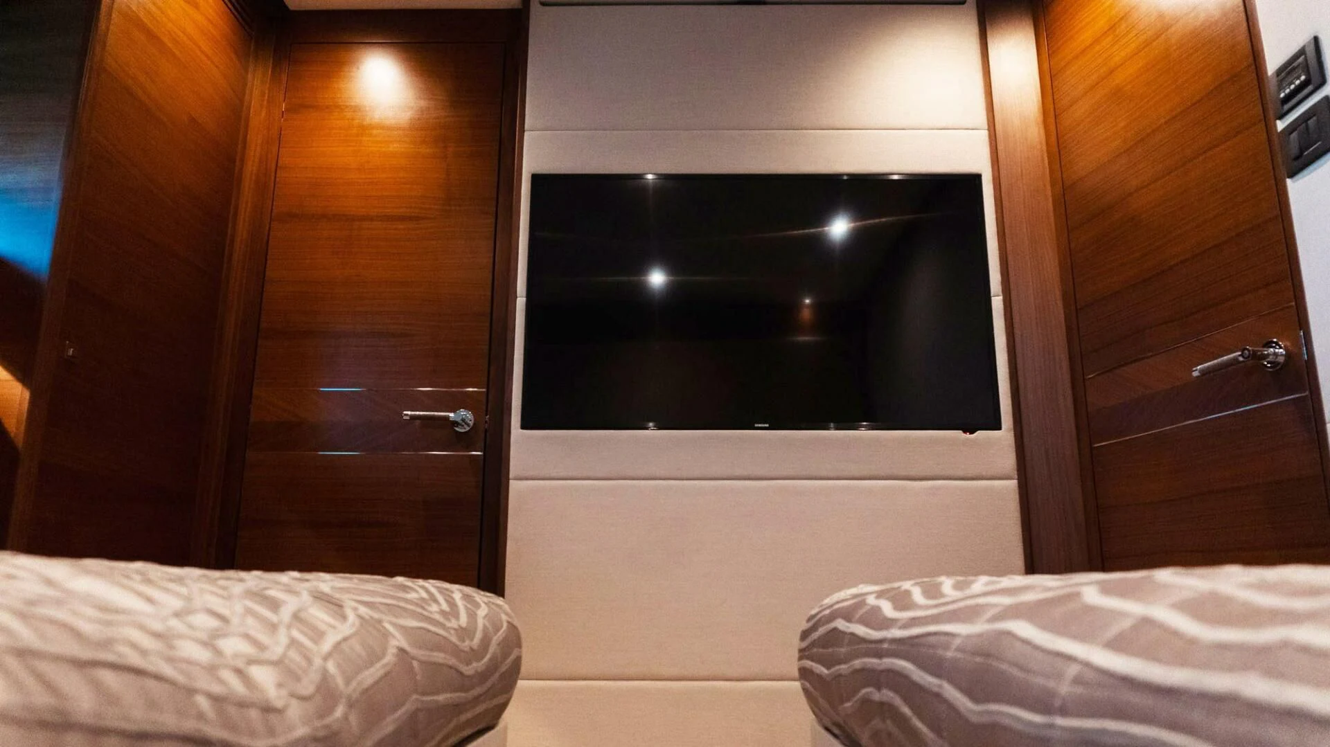 a bed next to a closet aboard MOIRA CINCO Yacht for Sale
