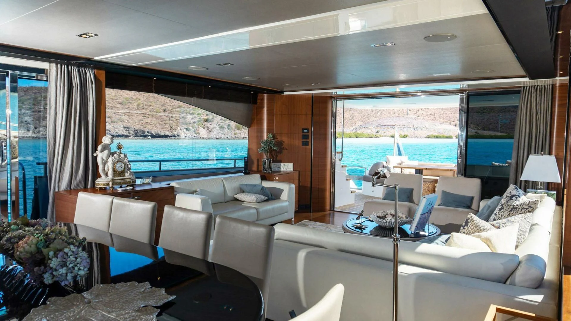 a room with a large window and a view of the ocean aboard MOIRA CINCO Yacht for Sale