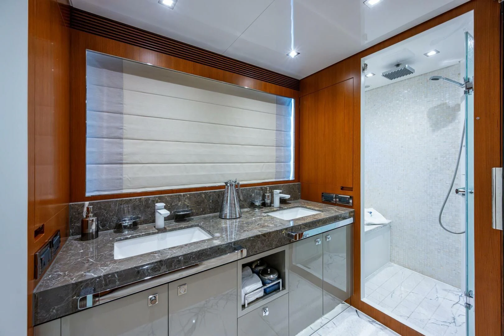 a bathroom with a countertop sink aboard MOIRA CINCO Yacht for Sale